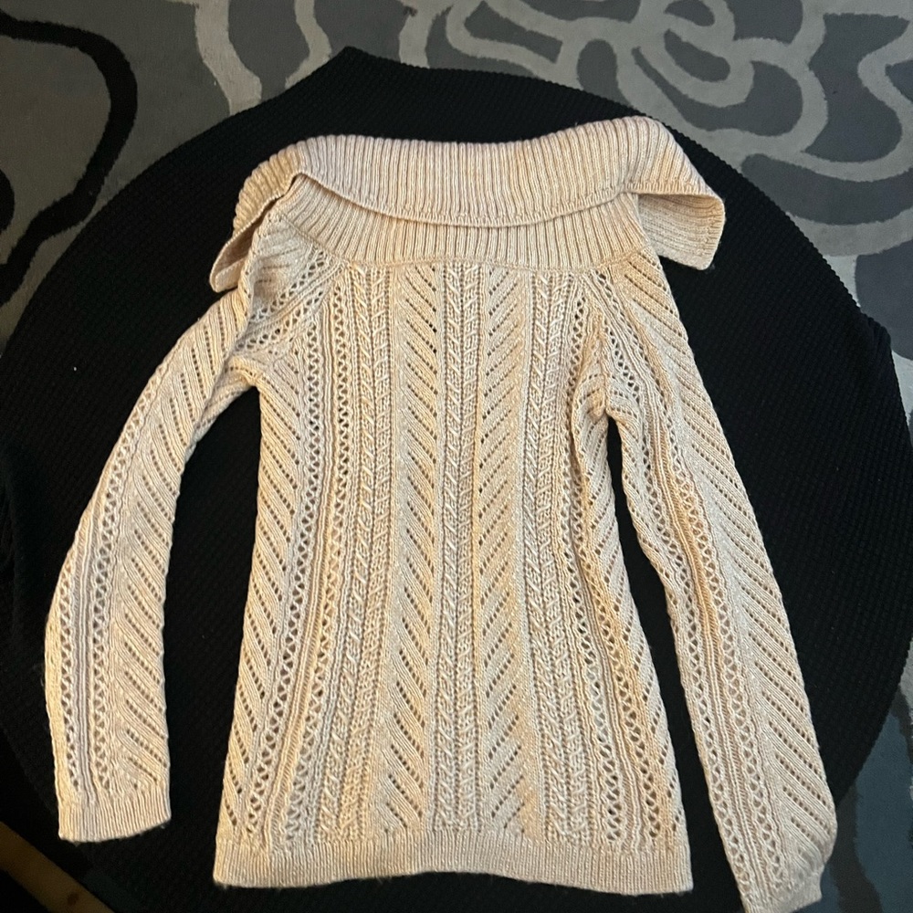 Peach cream color sweater.
